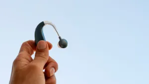Low Angle Hand Holding Hearing Aids Low